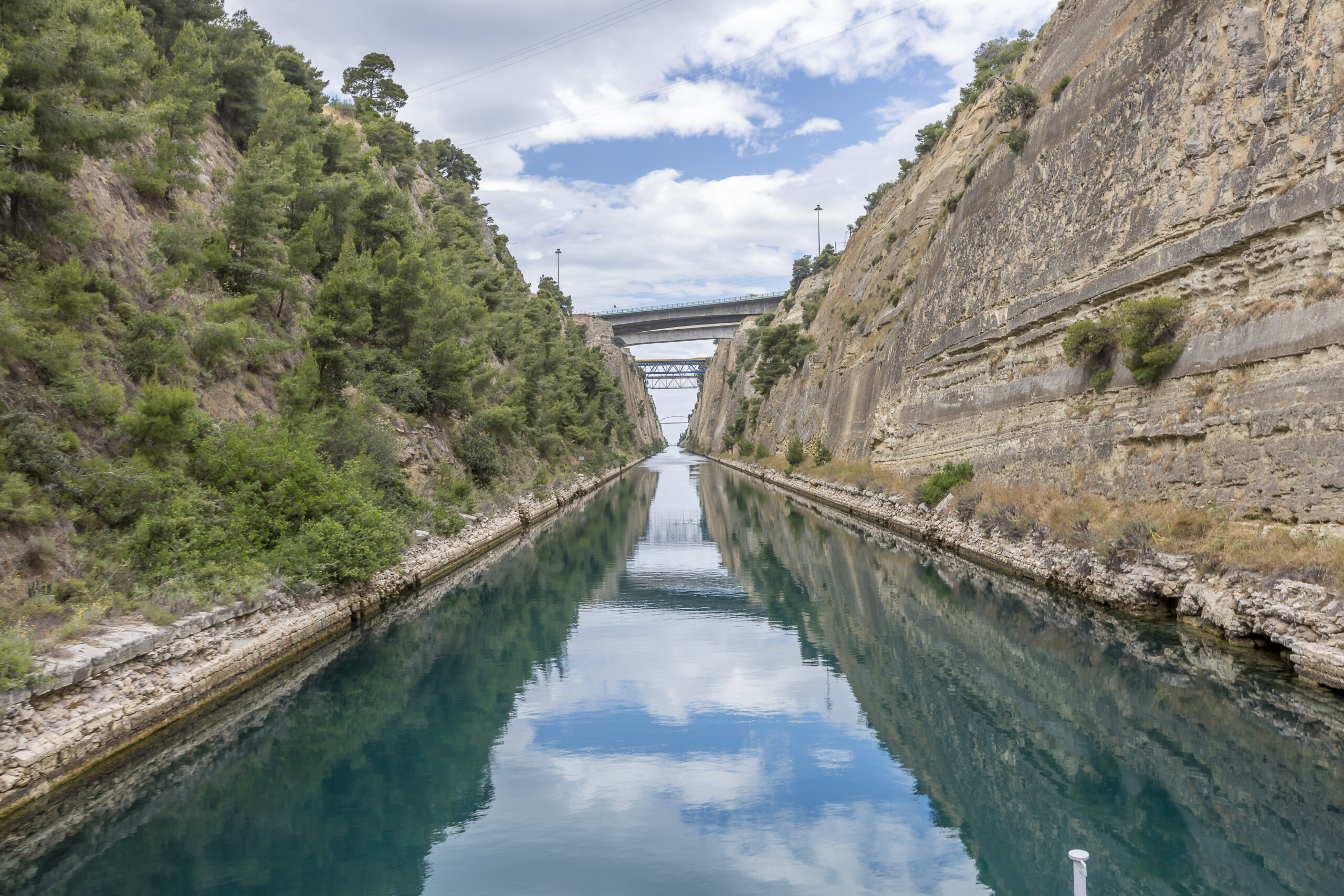 Greece Corinth Canal In Cloudy Weather Several Bridges Sailing Yacht.